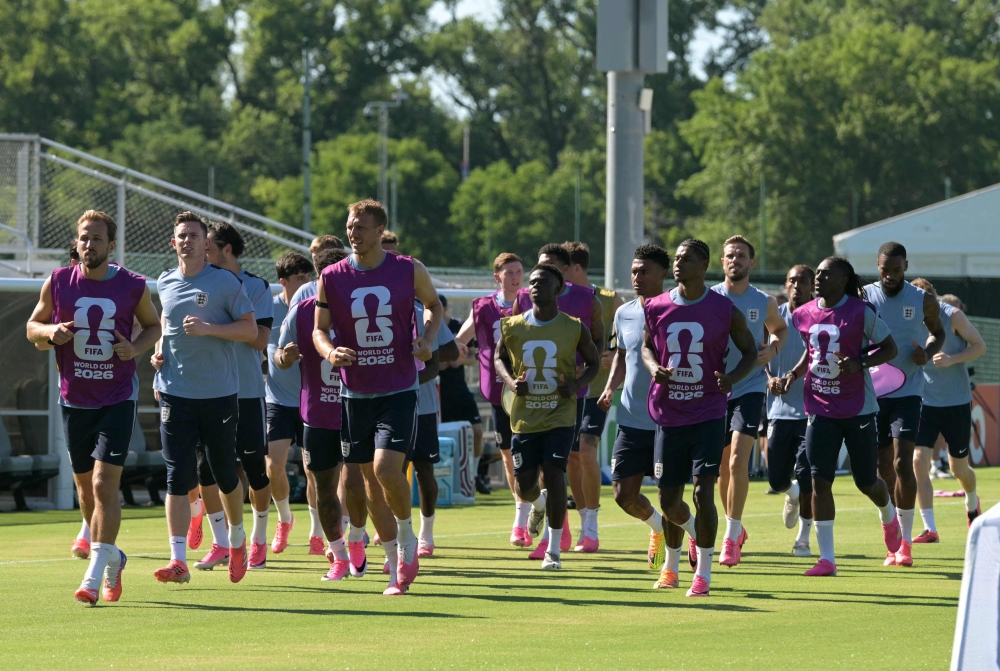 England players jog during a training session ahead of England's 2026 World Cup football tournament Group L football match against Croatia at Swope Soccer Village in Kansas City on June 13, 2026. (Photo by Juan Mabromata/ AFP)