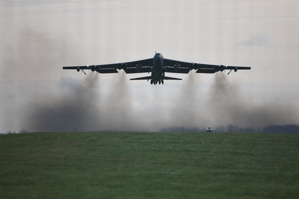 (Files) A US Air Force B-52 Stratofortress bomber takes off from RAF Fairford in south-west England on March 15, 2026. (Photo by Henry Nicholls / AFP)