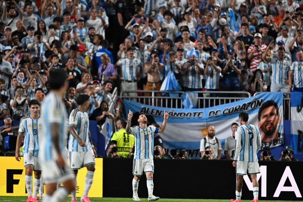Argentina's forward #10 Lionel Messi celebrates scoring his team's third goal during the 2026 World Cup Group J football match between Argentina and Algeria at the Kansas City Stadium in Kansas City on June 16, 2026. (Photo by Roberto Schmidt / AFP)