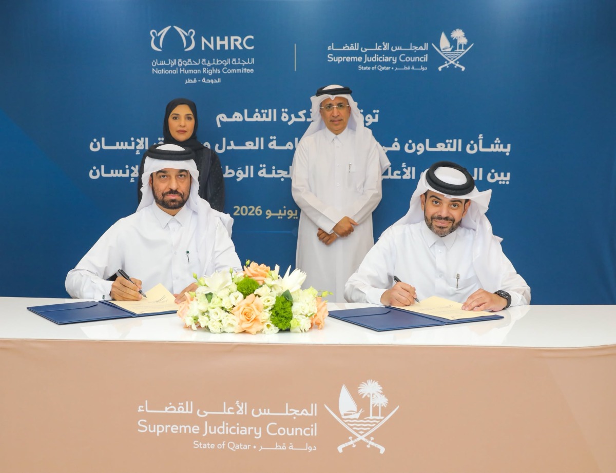 President of the SJC and President of the Court of Cassation H E Dr. Hassan bin Lahdan Al Hassan Al Mohannadi and Chairperson of the National Human Rights Committee H E Maryam bint Abdullah Al Attiyah witnessing the signing ceremony.
