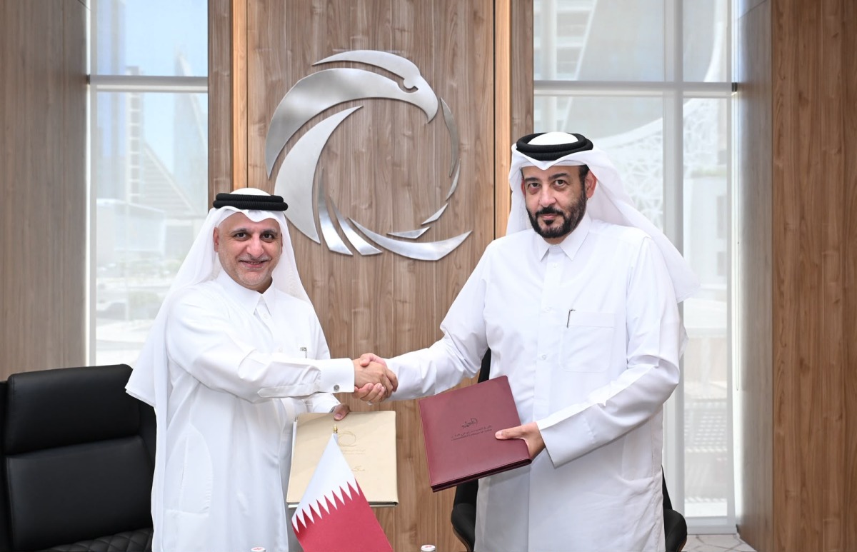 NCSA President Eng. Abdulrahman bin Ali Al Farahid Al Malki, and President of the Community College of Qatar, Dr. Khalid Mohammed Al Horr during the signing ceremony.
