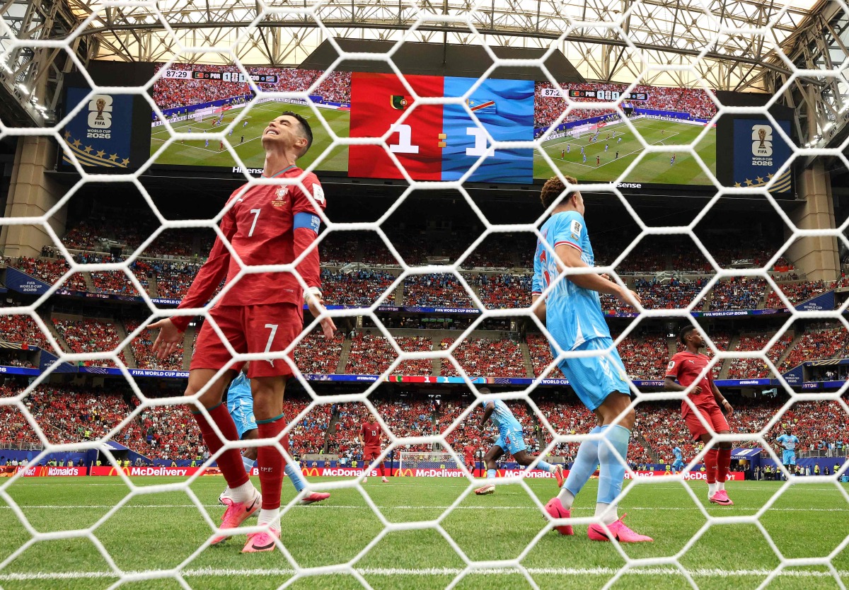 Cristiano Ronaldo #7 of Portugal reacts after a missed chance during the FIFA World Cup 2026 Group K match between Portugal and Congo DR at Houston Stadium on June 17, 2026 in Houston, Texas. (Photo by Molly Darlington / GETTY IMAGES NORTH AMERICA / Getty Images via AFP)