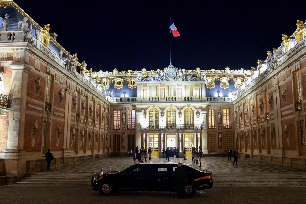 US President Donald Trump's presidential limo waits for his departure following a dinner at Chateau de Versailles on June 17, 2026 in Versailles, France. Anna Moneymaker/Getty Images/AFP 