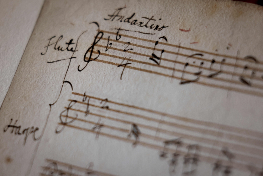 This photograph shows an original fragment of Wolfgang Amadeus Mozart music handwritten notebook at Richelieu Library (Bibliotheque Nationale de France-National Library of France-BnF) in Paris. I(Photo by Kenzo TRIBOUILLARD / AFP)