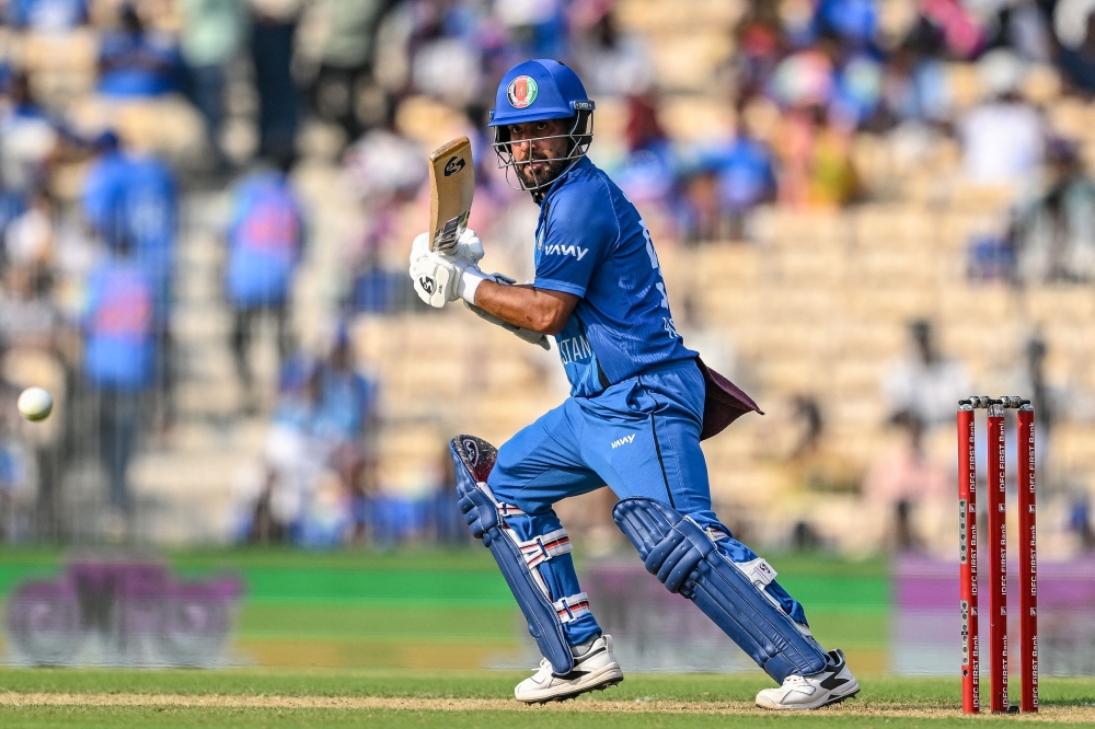 Afghanistan's captain Hashmatullah Shahidi plays a shot during the third one-day international (ODI) cricket match between India and Afghanistan on June 20, 2026. (Photo by R.Satish Babu / AFP)