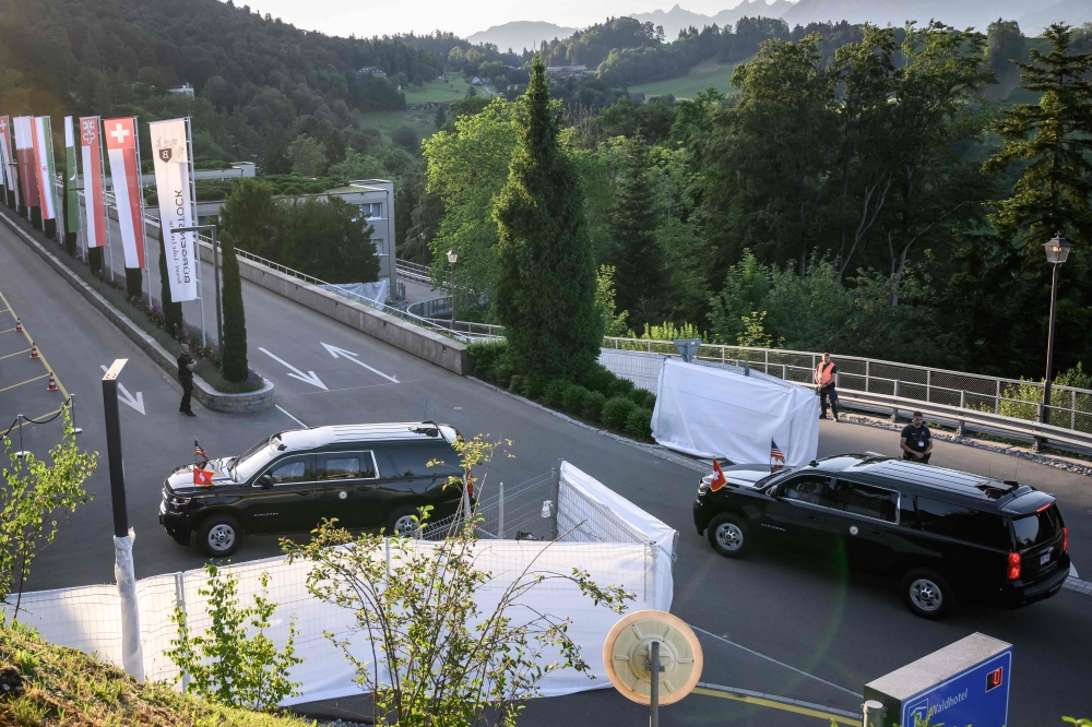 The motorcade transporting US Vice President JD Vance arrives at the Burgenstock luxury hotel complex overlooking Lake Lucerne, Switzerland, on June 21, 2026. (Photo by Fabrice Coffrini / AFP)