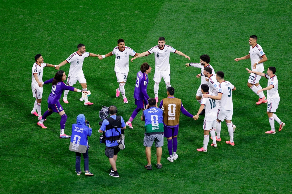Mexico's players gather around goalkeeper #13 Guillermo Ochoa after winning the 2026 World Cup Group A football match between the Czech Republic and Mexico at the Mexico City Stadium in Mexico City on June 24, 2026. (Photo by Rodrigo Oropeza / AFP)