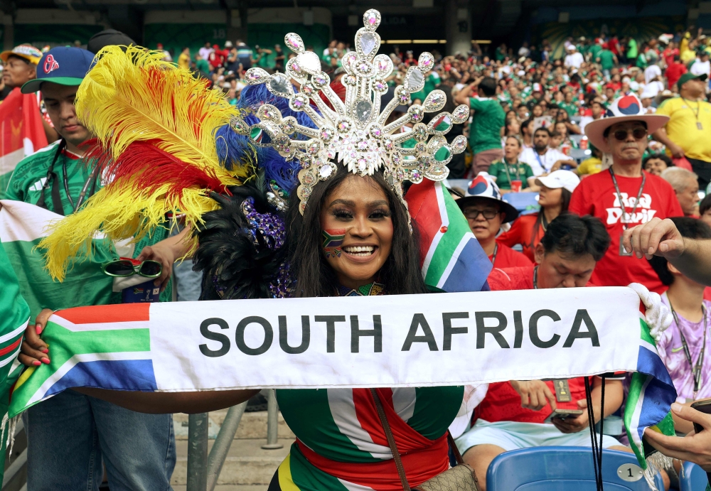 A South African fan cheers for her team during the 2026 World Cup Group A football match in Guadalupe, Mexico, on June 24, 2026. (Photo by Julio Cesar Aguilar / AFP)
