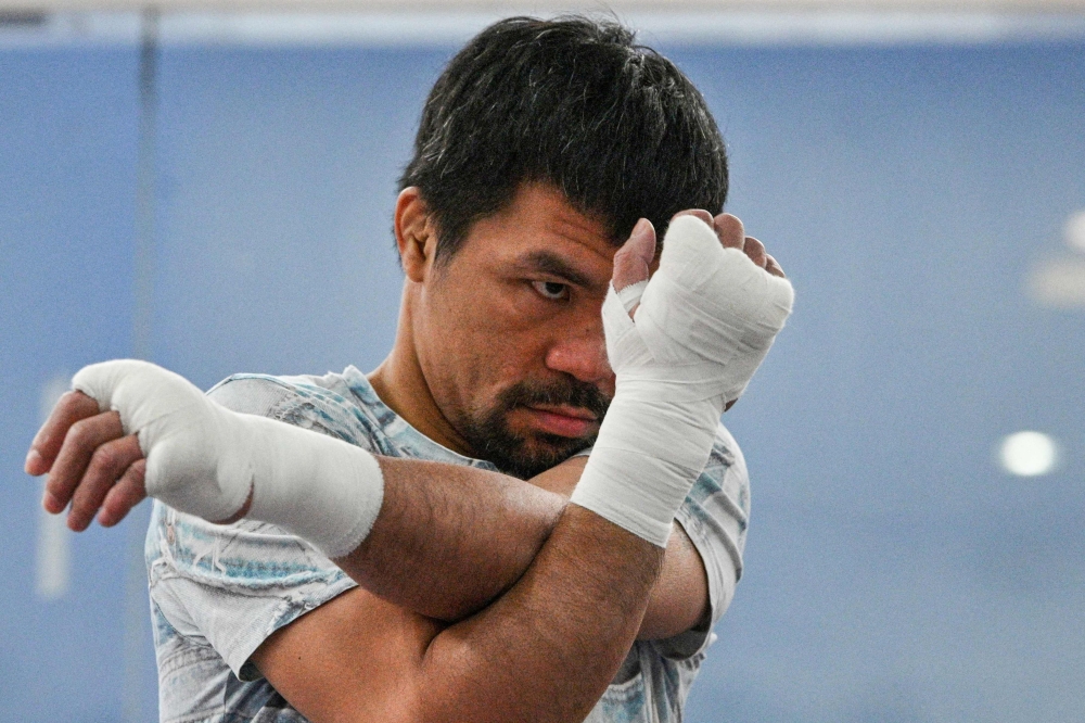 Philippine boxing legend Manny Pacquiao trains at his gym in General Santos on the southern island of Mindanao on June 22, 2021. Photo by TED ALJIBE / AFP