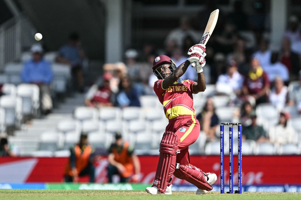 West Indies' Deandra Dottin plays a shot during the ICC Women's T20 cricket world cup 2026 semi-final game between Australia and West Indies, at The Oval in London on June 30, 2026. (Photo by JUSTIN TALLIS / AFP)
