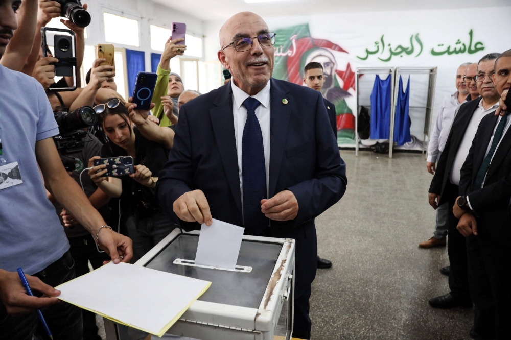 Head of Algeria's Islamist Movement of Society for Peace (MSP) Abdelaali Hassani Cherif casts his ballot during parliamentary elections in Algiers on July 2, 2026. (Photo by AFP)