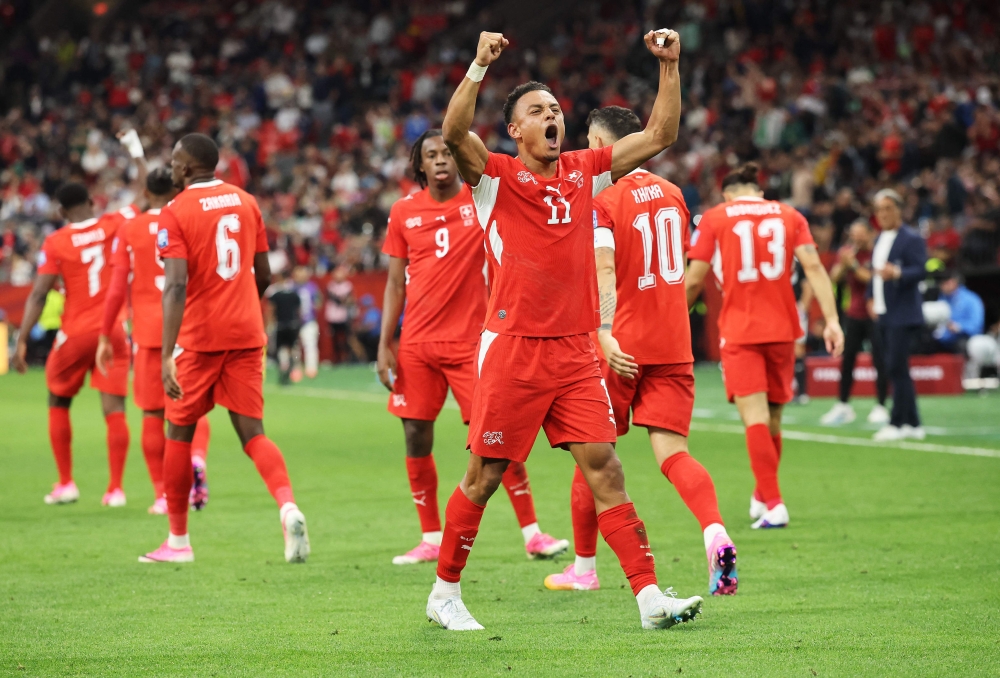 Dan Ndoye #11 of Switzerland celebrates scoring his team's second goal. Alex Grimm/Getty Images/AFP