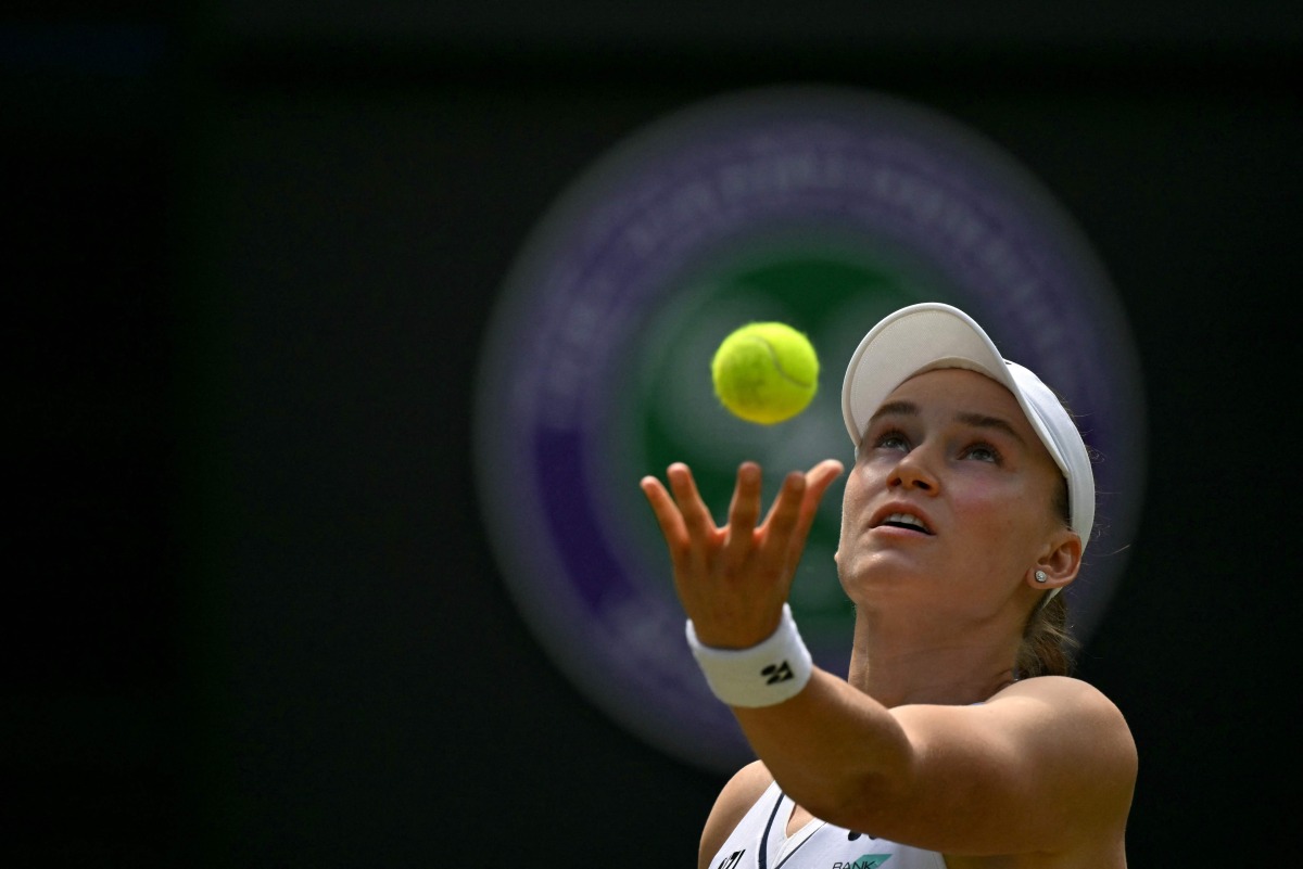 Kazakhstan's Elena Rybakina serves to Belgium's Elise Mertens during their women's singles third round tennis match on the sixth day of the 2026 Wimbledon Championships at The All England Lawn Tennis and Croquet Club in Wimbledon, southwest London, on July 4, 2026. (Photo by Glyn KIRK / AFP) 