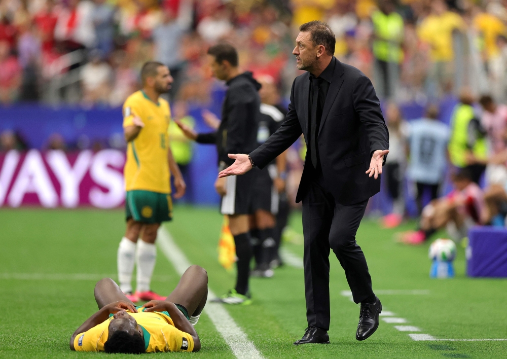 Tony Popovic, Head Coach of Australia, reacts as Nestory Irankunda #17 of Australia is fouled. Alex Slitz/Getty Images/AFP 