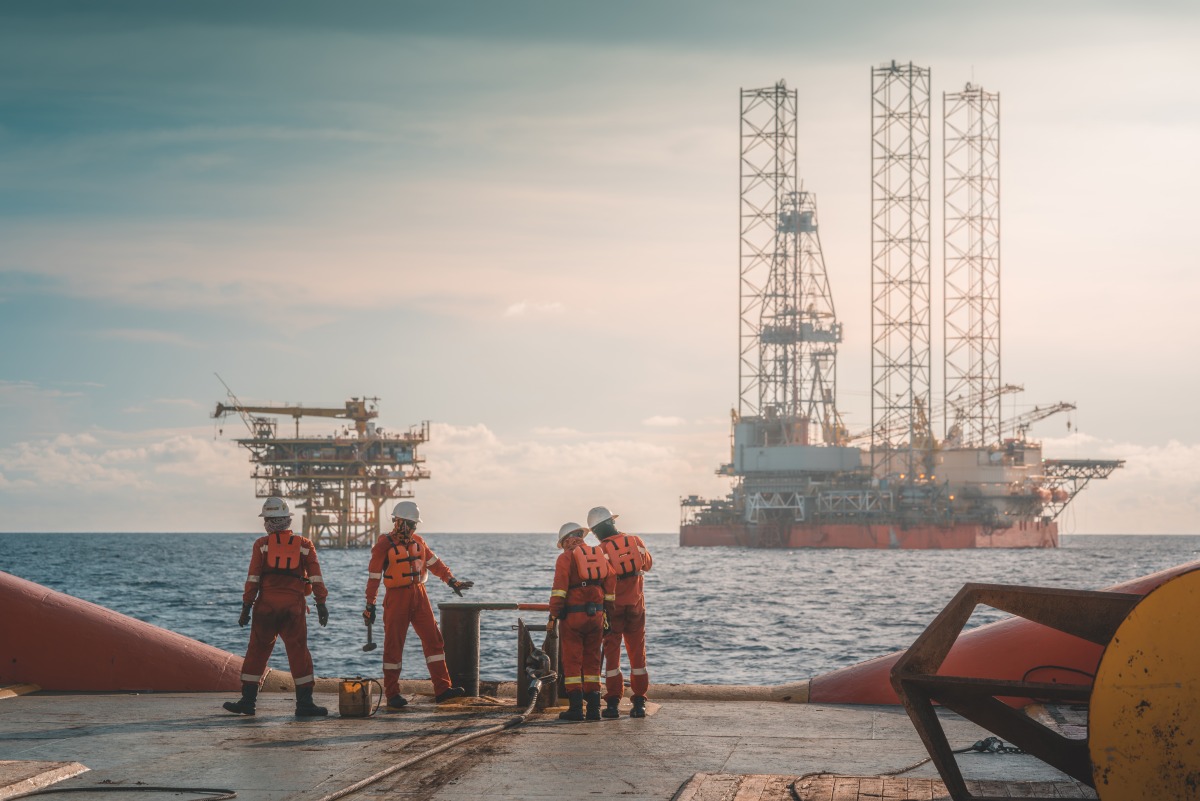 Anchor handling activity during rig move operation at oil field.