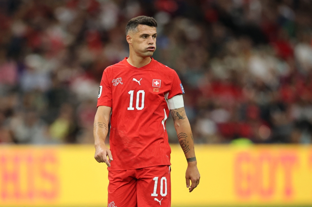 Granit Xhaka #10 of Switzerland reacts during the FIFA World Cup 2026 Round Of 32 match between Switzerland and Algeria on July 02, 2026 in Vancouver, British Columbia. Alex Grimm/Getty Images/AFP