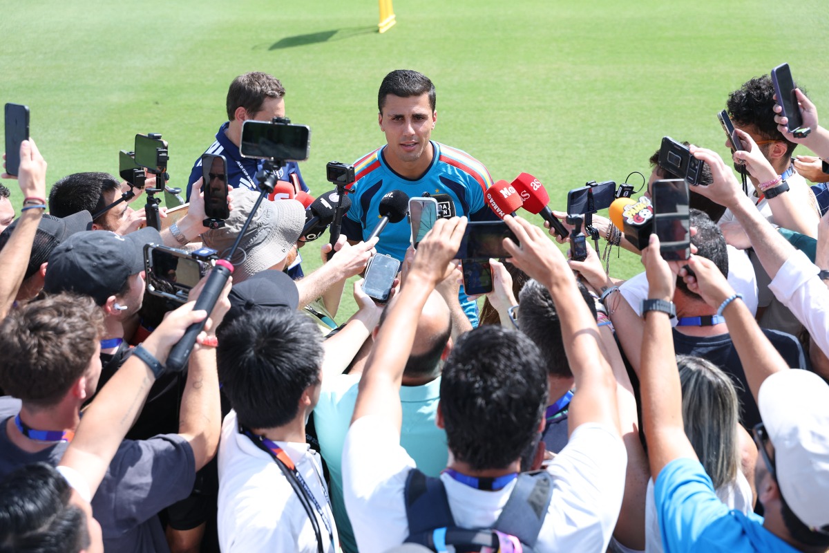 Spain's midfielder #16 Rodri speaks to media before an MD-1 training session at the Cotton Bowl in Dallas on July 5, 2026, on the eve of the 2026 World Cup round of 16 football match between Portugal and Spain. (Photo by Thomas COEX / AFP)