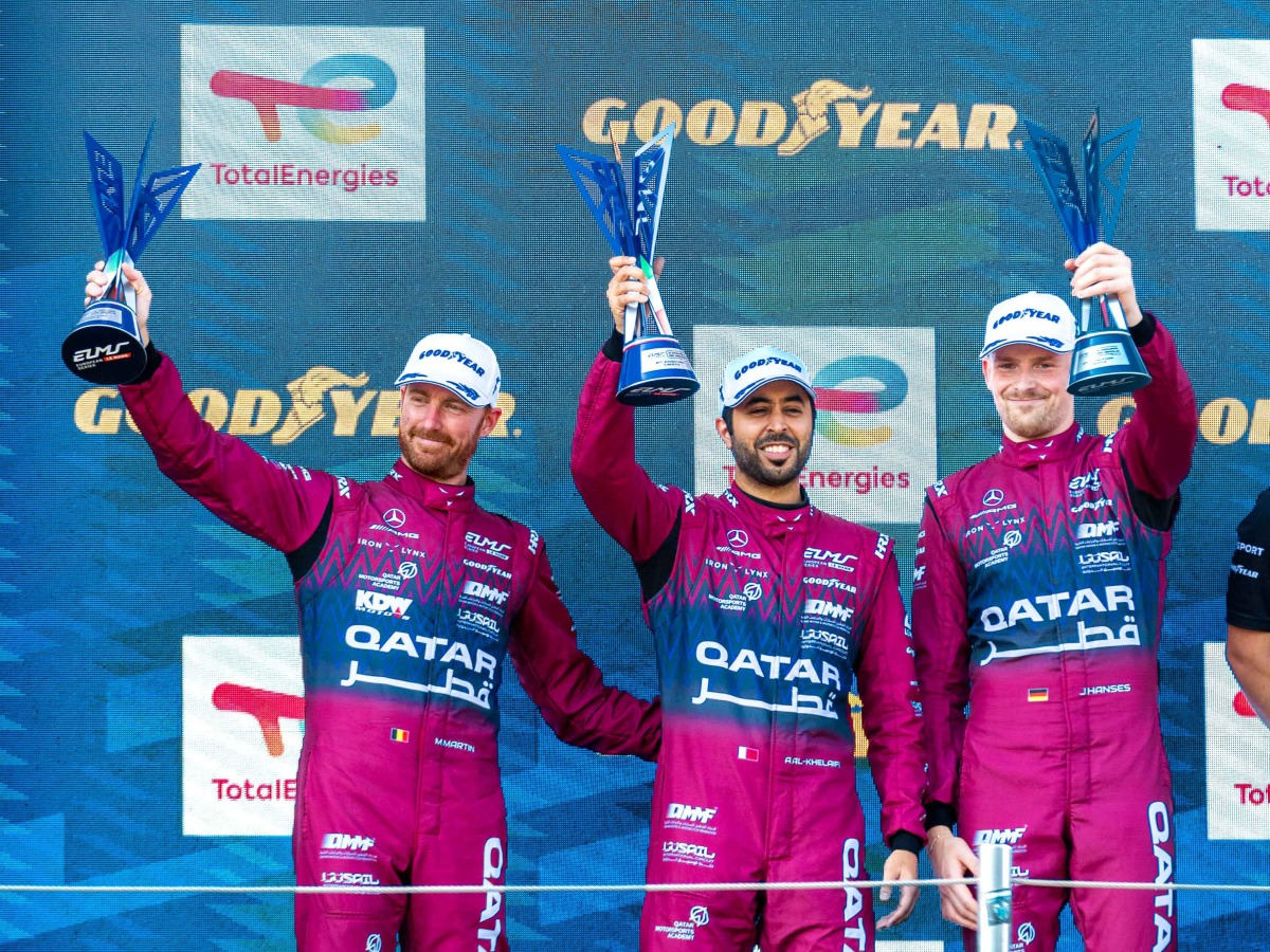 Team Qatar by Iron Lynx drivers Abdulla Al-Khelaifi, Julian Hanses and Maxime Martin celebrate on the podium after securing the second place in the LMGT3 category at the 4 Hours of Imola.