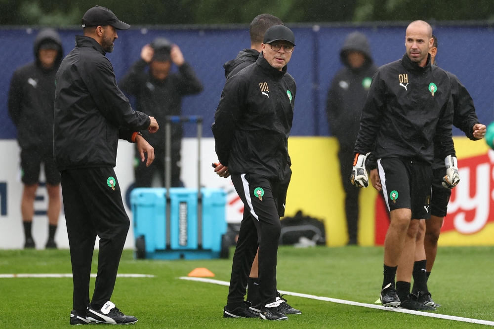 Morocco's head coach Mohamed Ouahbi (C) takes part in a training session at the New England Revolution Training Centre in Foxborough, near Boston, on July 7 2026, during the 2026 World Cup football tournament. (Photo by Franck Fife / AFP)