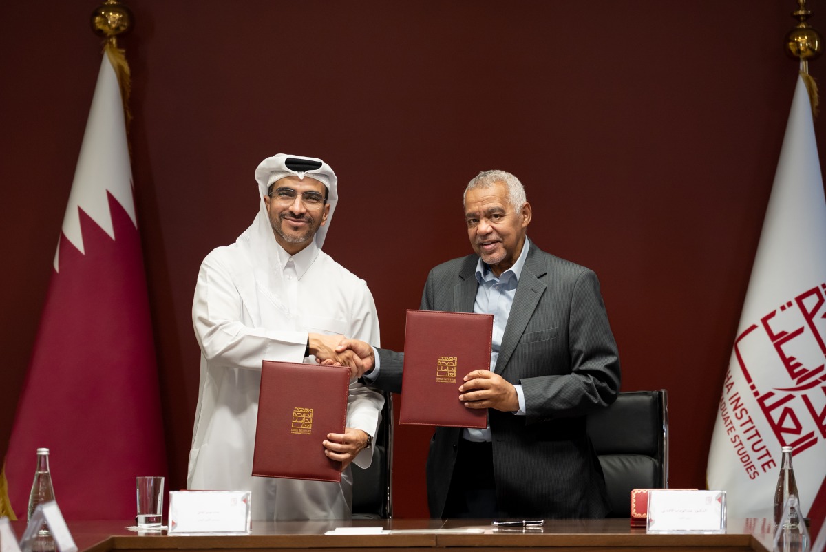 Assistant Secretary-General for Future Foresight and National Visions Center at the National Planning Council Bassam Issa Al Mannai and President of the Doha Institute for Graduate Studies Dr. Abdelwahab El-Affendi during the signing of the MoU. 
