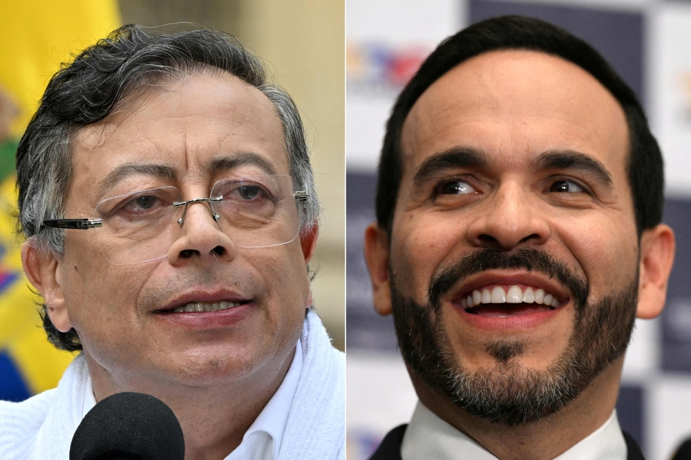 (FILES) (COMBO) This combination of file pictures created on July 07, 2026 shows Colombia's President Gustavo Petr (L) speaking after casting his vote during the presidential election in Bogota on May 31, 2026, and Colombia's presidential candidate Abelardo de la Espriella smiling during the presentation of his running mate Jose Manuel Restrepo at the Cali registration office in Cali, Colombia, on March 12, 2026.  (Photo by Luis Acosta and Joaquin Sarmiento/ AFP)
