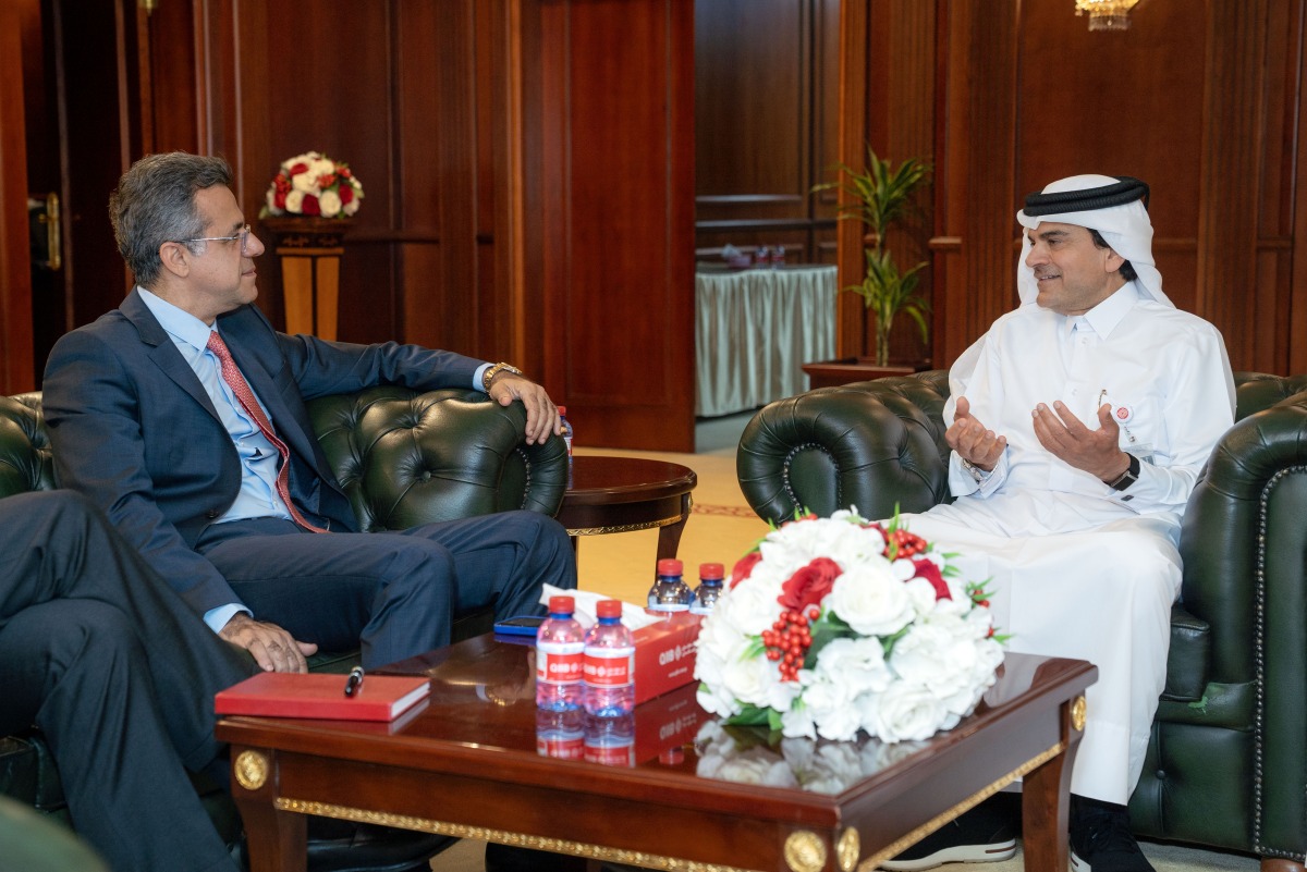 CEO of QIIB Dr. Abdulbasit Ahmed Al-Shaibei with Senior Vice President and Group Country Manager for Visa across the UAE, Kuwait, and Qatar Fadi Moukaddem.