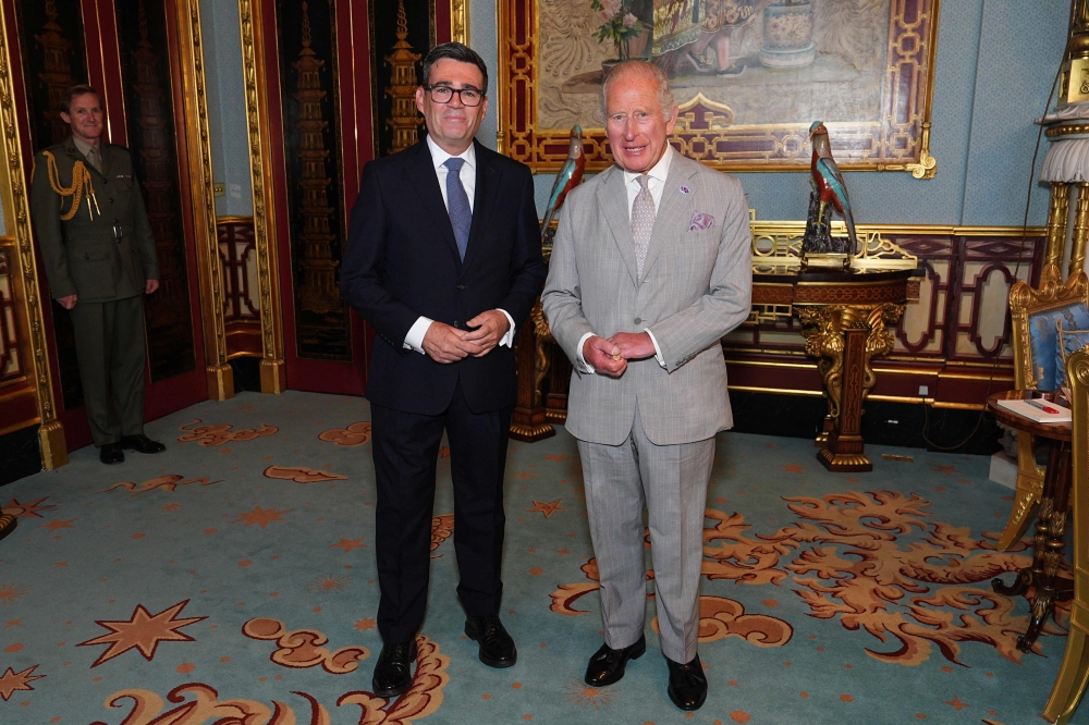 King Charles Britain's King Charles III poses with Britain's incoming Prime Minister Andy Burnham on July 20, 2026 (Photo by Aaron Chown / Pool / AFP)