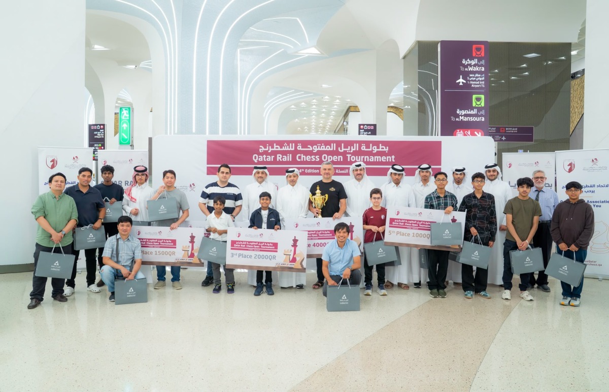 Officials with all the winners of the fourth Chess Open.