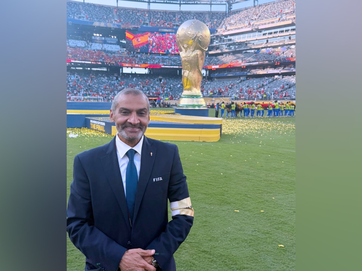 Hani Taleb Ballan poses for a photo at the New York/New Jersey Stadium at the end of the FIFA World Cup final.