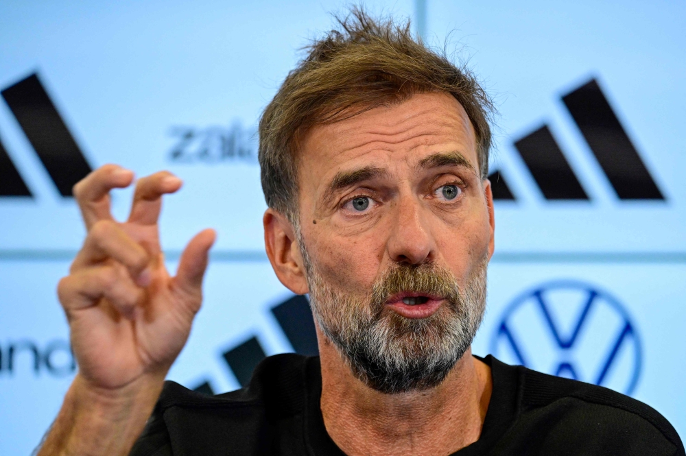Newly appointed German coach Jurgen Klopp addresses a press conference at the headquarters of the German Football Federation (DFB) in Frankfurt am Main, western Germany on July 24, 2026. (Photo by John MacDougall / AFP)