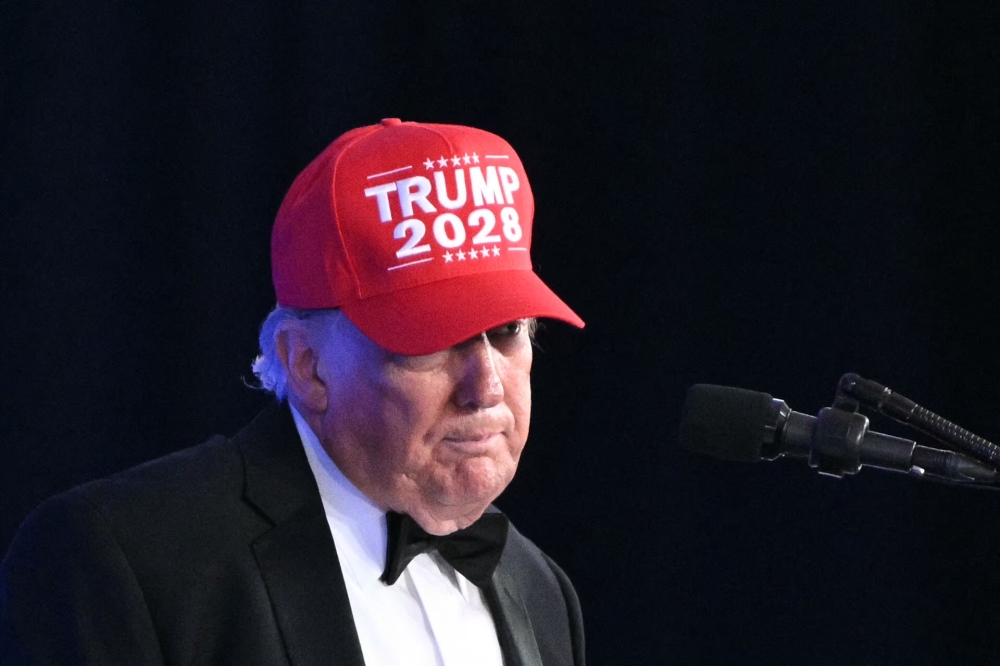 US President Donald Trump wears a 