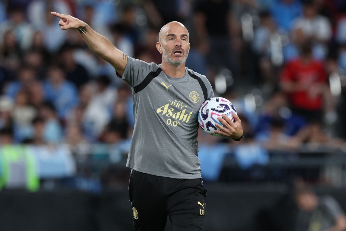 Manchester City manager Enzo Maresca gestures as he coaches the team during the open training ahead of their friendly football match against Inter Milan for the Asahi Super Dry Trophy at Kai Tak Stadium in Hong Kong on July 31, 2026. (Photo by May JAMES / AFP)
