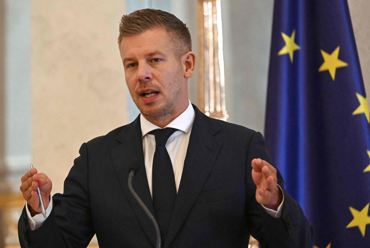 Hungary's Prime Minister Peter Magyar informs the press with the Speaker of the Hungarian Parliament at the presidential palace in Budapest, on August 3, 2026 on the government's handling of the heat wave and the energy crisis. (Photo by Attila KISBENEDEK / AFP)