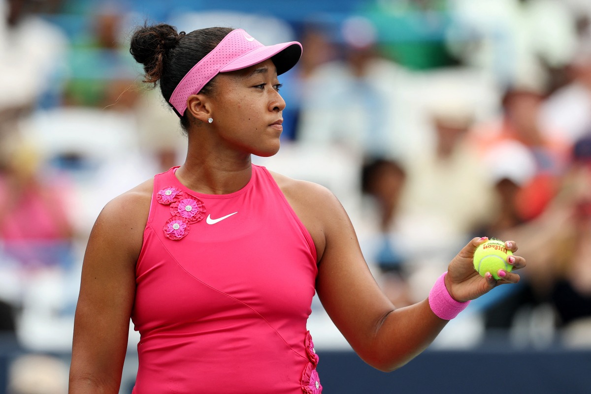 Naomi Osaka of Japan serves during a women's singles match against Alexandra Eala of the Philippines on day six of the Mubadala DC Open 2026 at William H.G. FitzGerald Tennis Center on August 01, 2026 in Washington, DC. Emilee Chinn/Getty Images/AFP 
