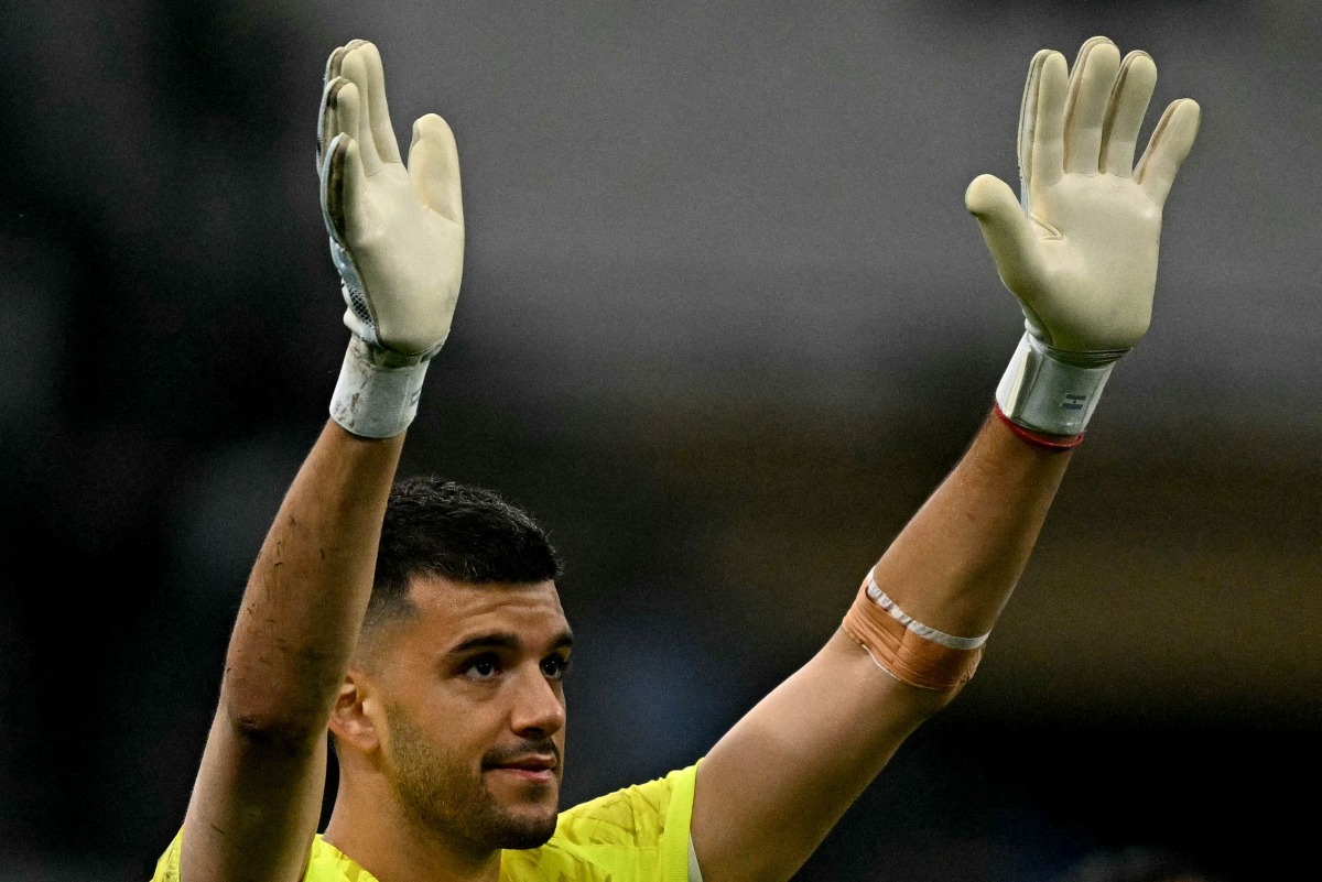 Marseille's Argentinian goalkeeper #01 Geronimo Rulli celebrates at the end of the French L1 football match between Olympique de Marseille (OM) and Stade Rennais FC at the Stade Velodrome in Marseille, southern France, on May 17, 2026. Photo by Gabriel BOUYS / AFP
