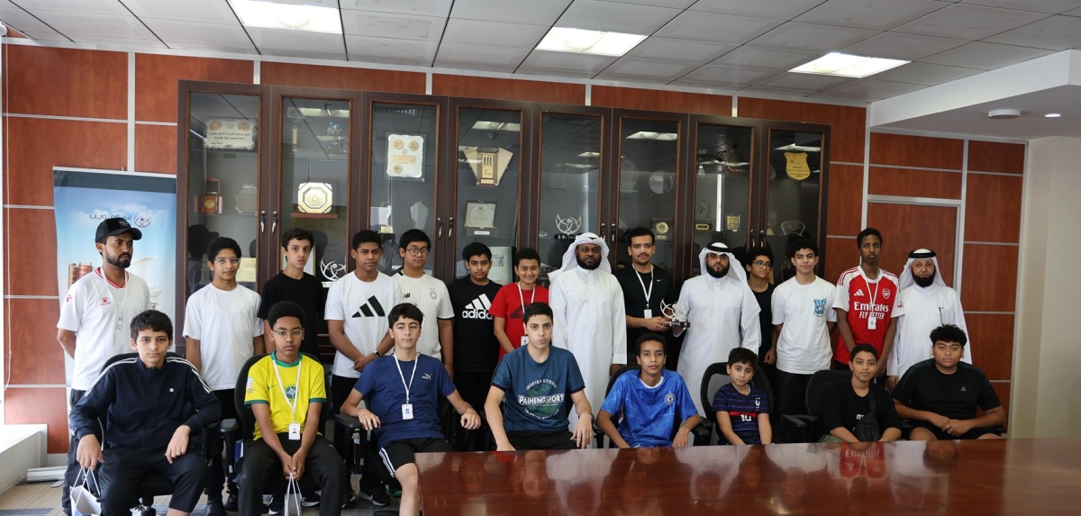 Officials with a group of students who participated in an awareness session.