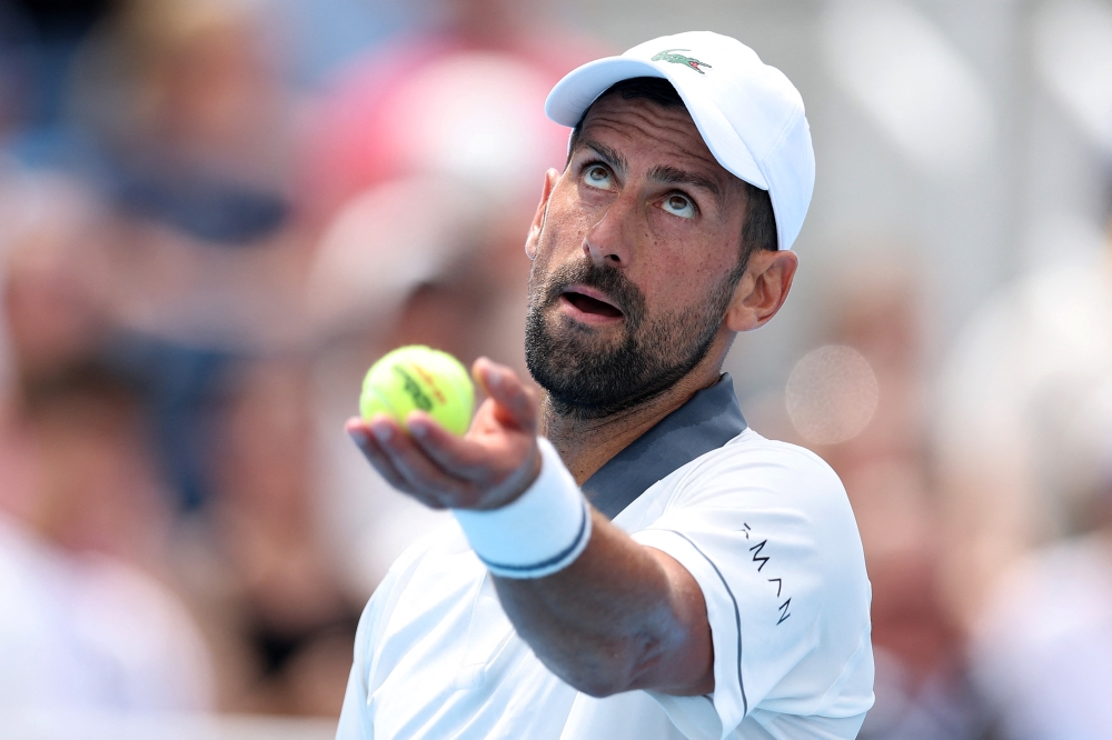Novak Djokovic of Serbia serves during a match against Thiago Tirante of Argentina on day five of the Cincinnati Open at Lindner Family Tennis Center on August 15, 2026 in Mason, Ohio. Emilee Chinn/Getty Images/AFP 