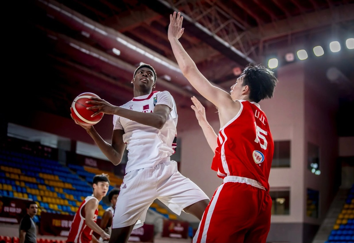 Action during Qatar's match against China.