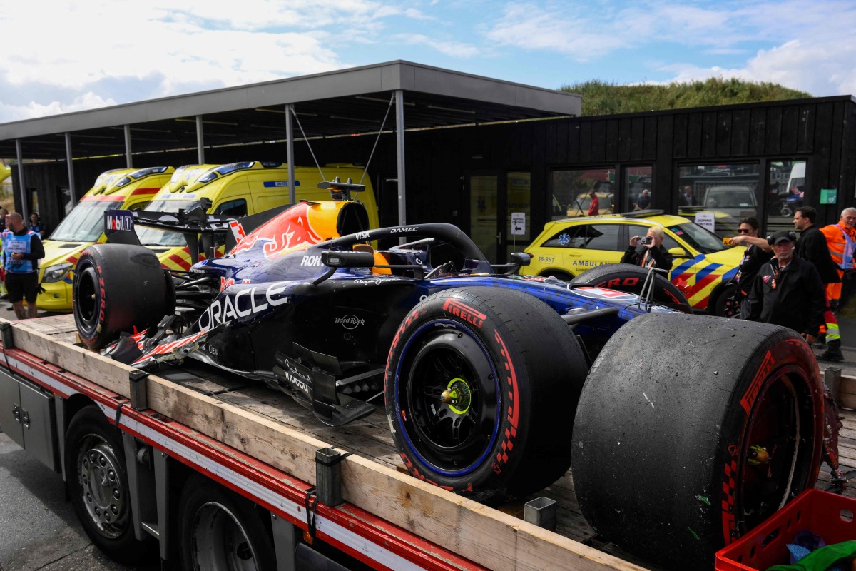 Red Bull Racing's Dutch driver Max Verstappen's car is moved following his crash during the Formula One Dutch Grand Prix at The Circuit Zandvoort, western Netherlands, on August 23, 2026. (Photo by JOHN THYS / AFP)