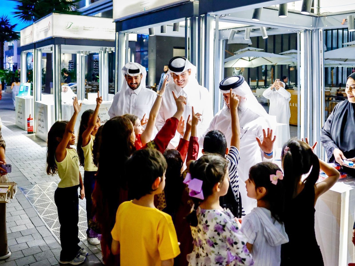 Officials and children during one of the activities