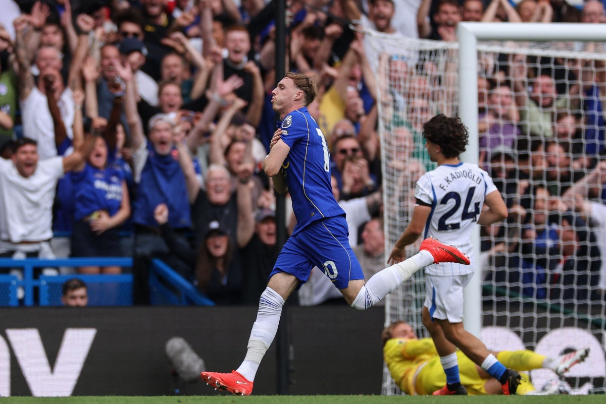 Chelsea's English midfielder #10 Cole Palmer (C) celebrates after scoring his team's fourth goal during the English Premier League football match between Chelsea and Brighton and Hove Albion at Stamford Bridge in London on August 30, 2026. (Photo by Adrian Dennis / AFP)