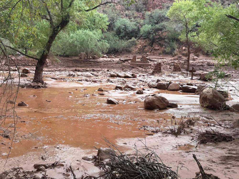 This handout image released by the Grand Canyon National Park Service via X (formerly Twitter) on August 30, 2026 shows remnants of stone bridge pylons along Bright Angel Creek following a flash flood that destroyed the footbridge on August 29. (Photo by J.THOMPSON and Handout / NATIONAL PARK SERVICE / AFP)