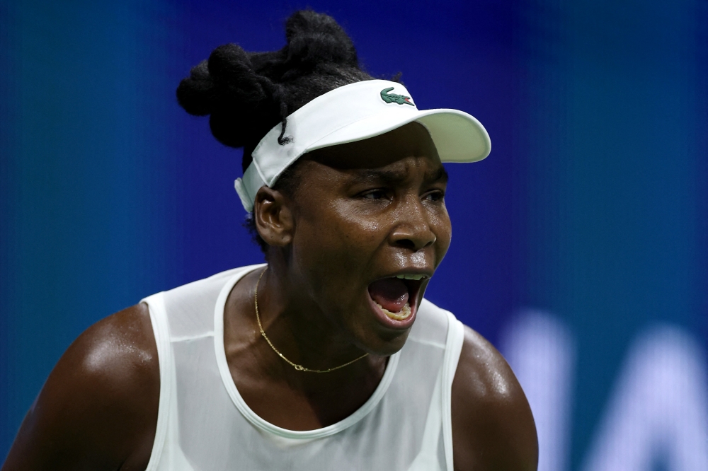 Venus Williams of the United States reacts against Sofia Kenin of the United States during her Women's Singles First Round match on Day One of the 2026 US Open at USTA Billie Jean King National Tennis Center on August 30, 2026 in the Flushing neighborhood of the Queens borough of New York City. (Mike Stobe/Getty Images/AFP)
