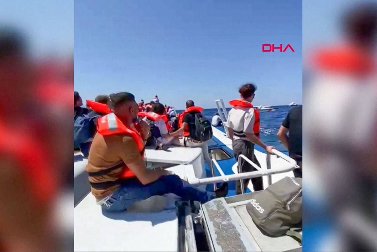 This screen grab image taken from UGC handout video courtesy of DHA on August 30, 2026, shows passengers waiting to be rescued at sea following the sinking of the ferry they were traveling on after it left the port of Kyrenia in the north of Mediterranean island of Cyprus. Photo by DHA (Demiroren News Agency) / AFP