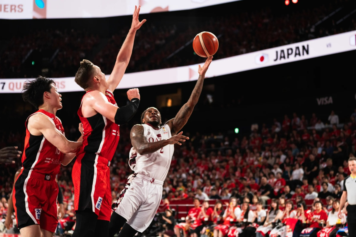 Action during the match between Qatar and Japan.
