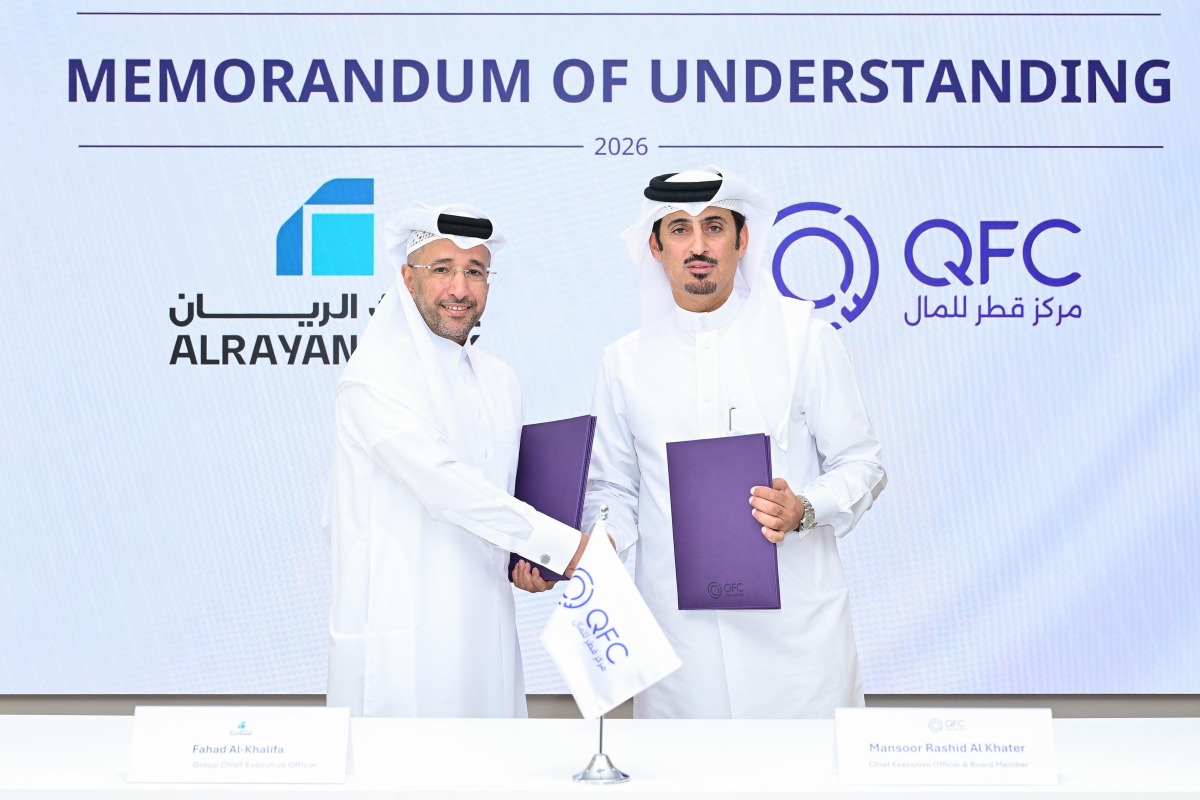 CEO of QFC Mansoor Rashid Al-Khater and Group CEO of AlRayan Bank Fahad bin Abdulla Al Khalifa during the MoU signing.