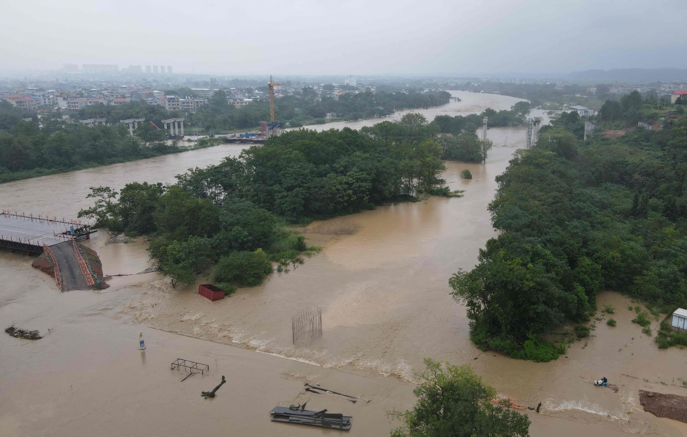 This aerial photo shows flood in Qianchuan, China's Central Jiangxi province on September 2, 2026. (Photo by CN-STR / AFP)