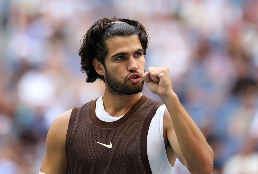 Carlos Alcaraz of Spain reacts in his match against Yibing Wu of China during their Men's Singles Third Round match on Day Six of the 2026 US Open at USTA Billie Jean King National Tennis Center on September 04, 2026 in the Flushing neighborhood of the Queens borough of New York City. (Photo by Julian Finney/AFP)
