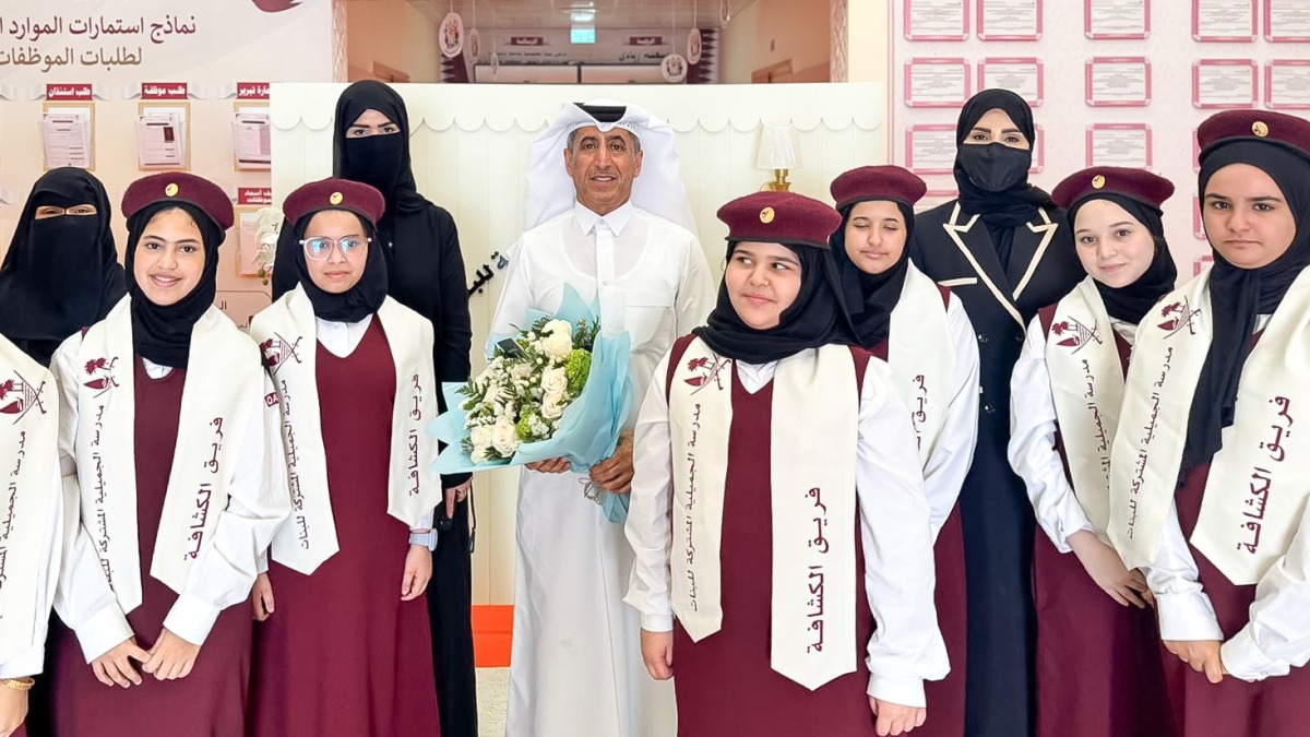 MoEHE Undersecretary Dr. Ibrahim bin Saleh Al Nuaimi with officials and students during his visit to a school yesterday.