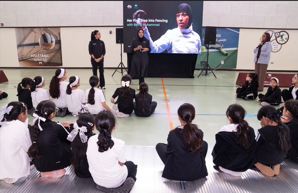 Ibtihaj Muhammad speaking to the young athletes during the Qatar Foundation’s Touché: International Fencing Day event at Education City.